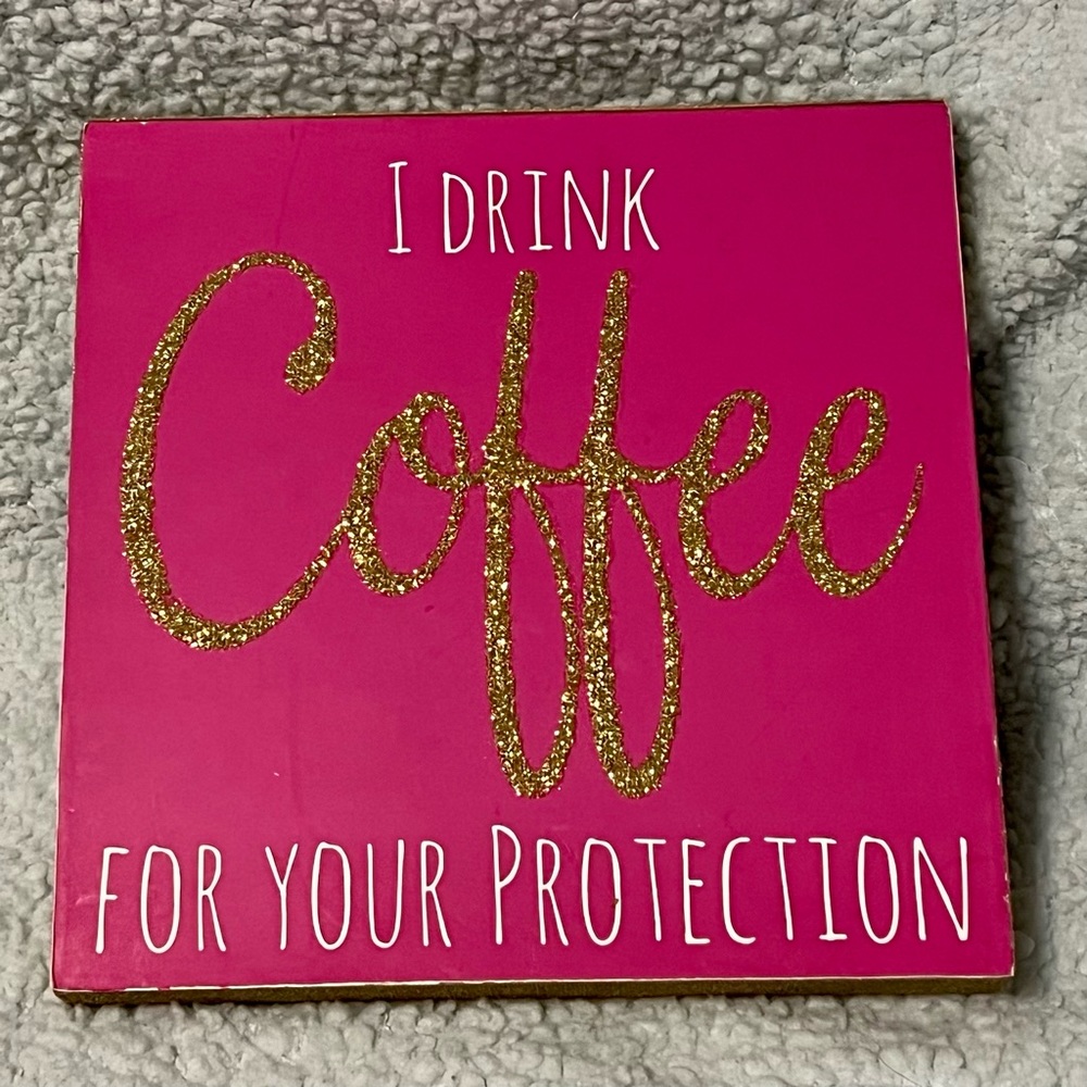 I drink coffee for your protection sign